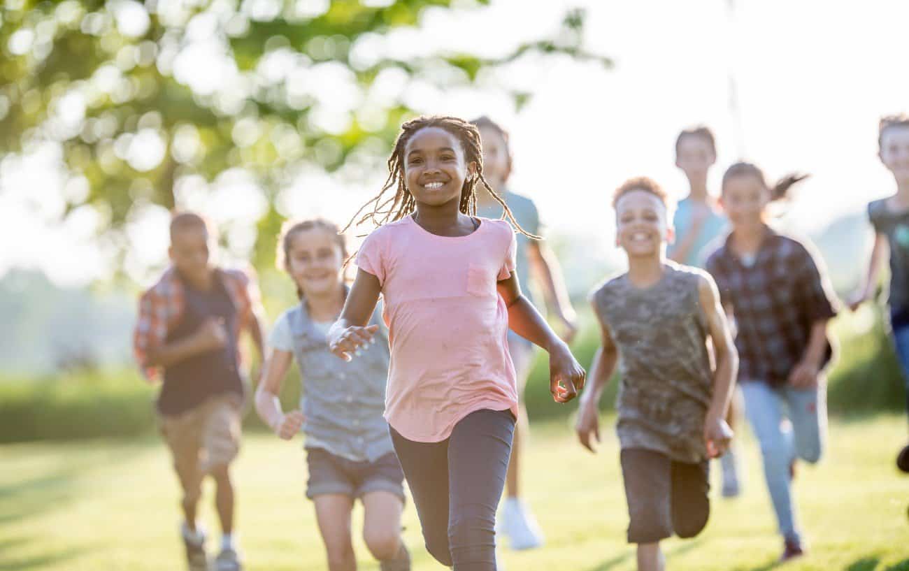 kids running in a field