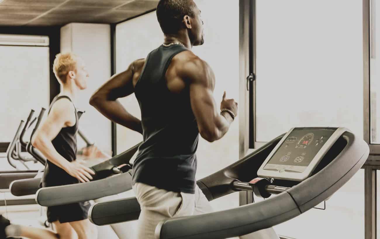Men running on treadmills.