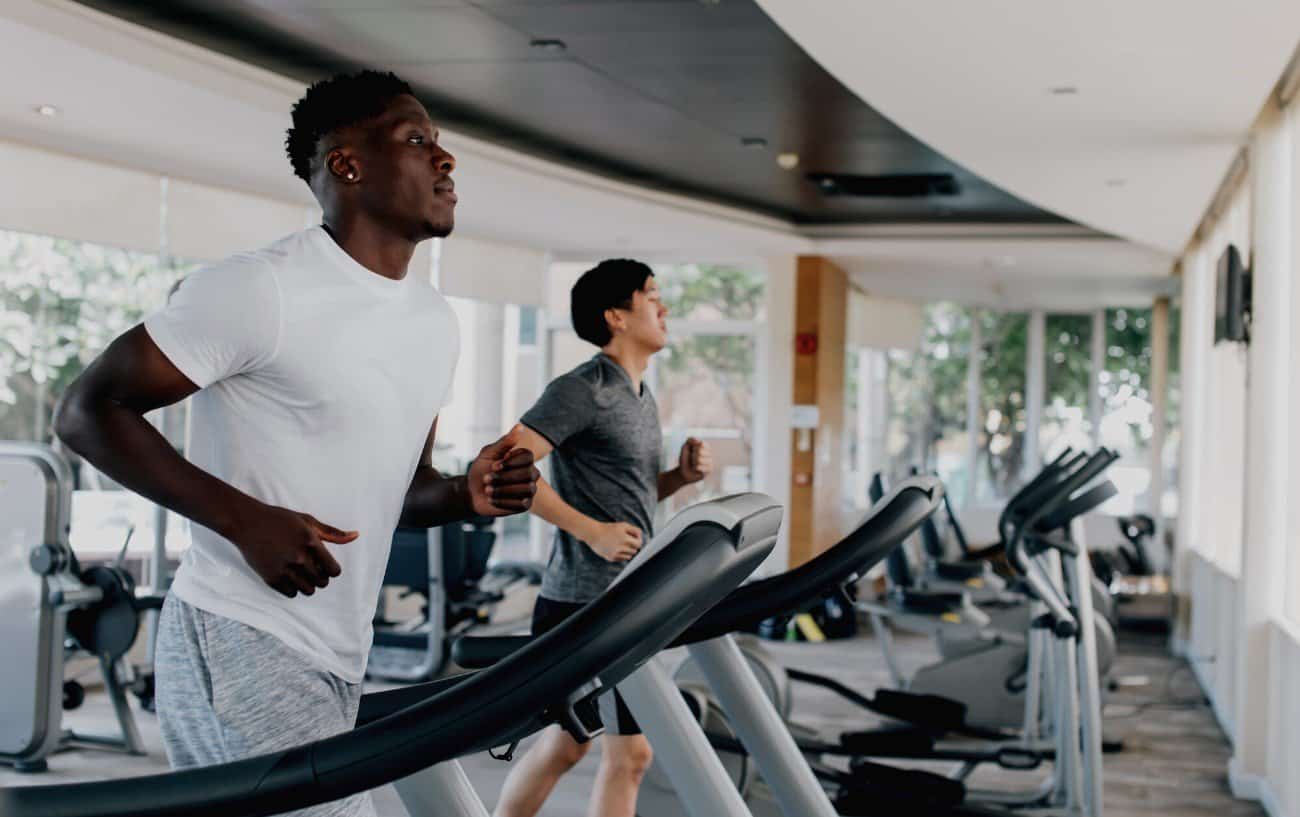 Men running on treadmills.