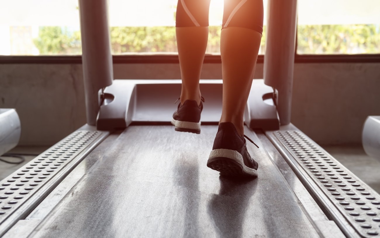 woman running on a treadmil