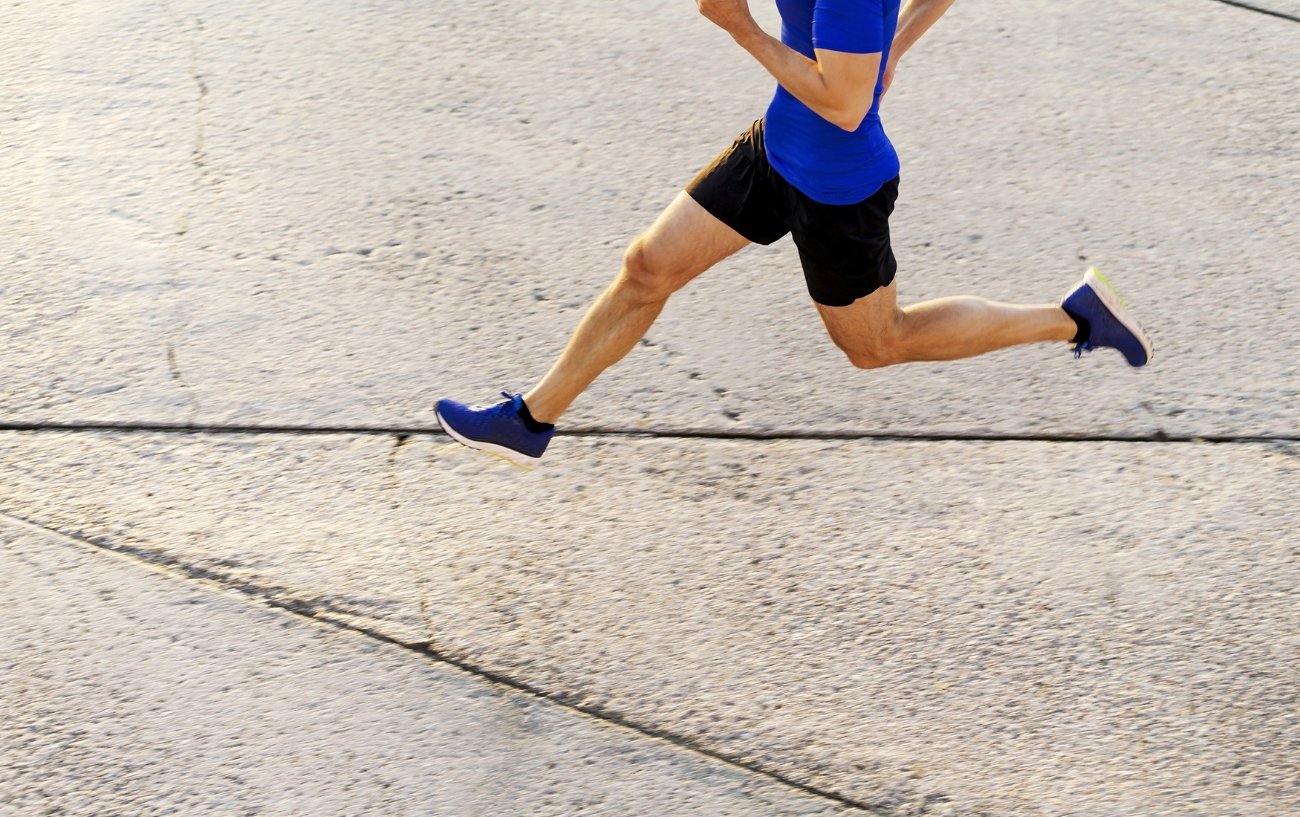 Man running on concrete
