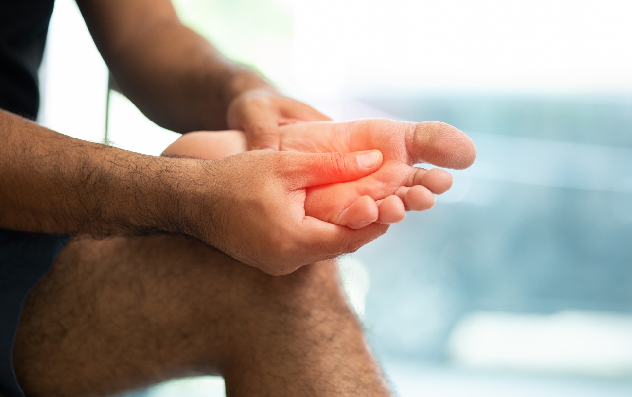 Man With Aching Foot