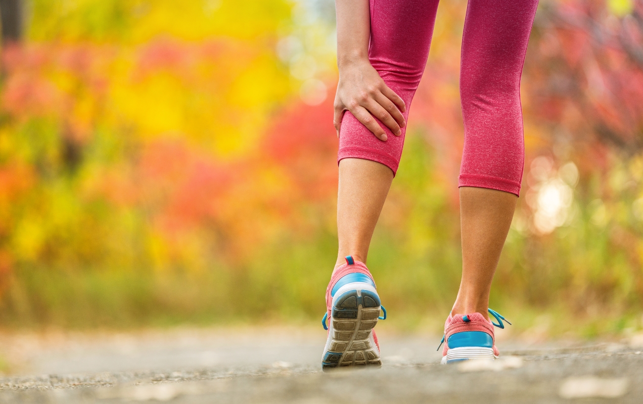 Woman with a leg cramp