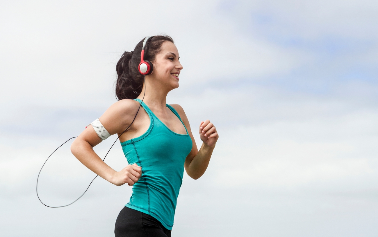 woman with headphones for running
