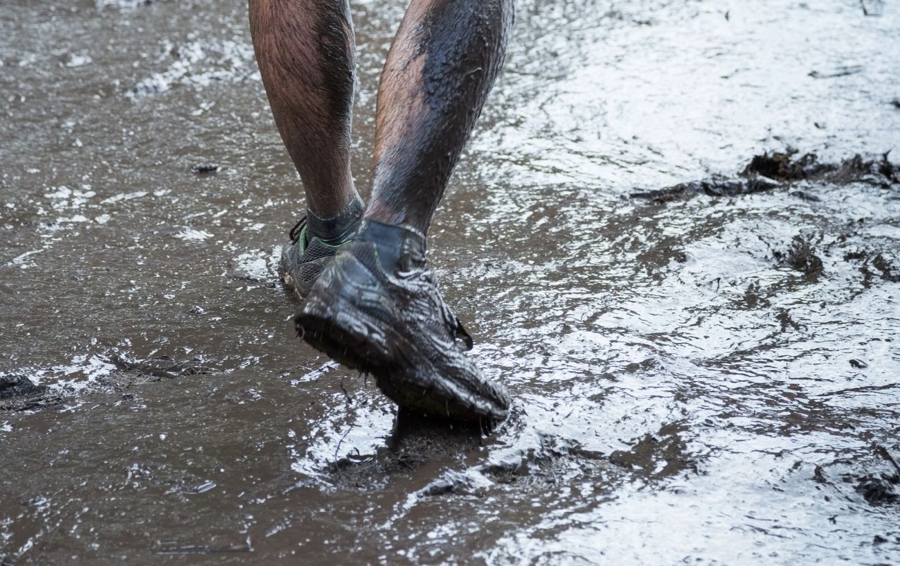person running in mud