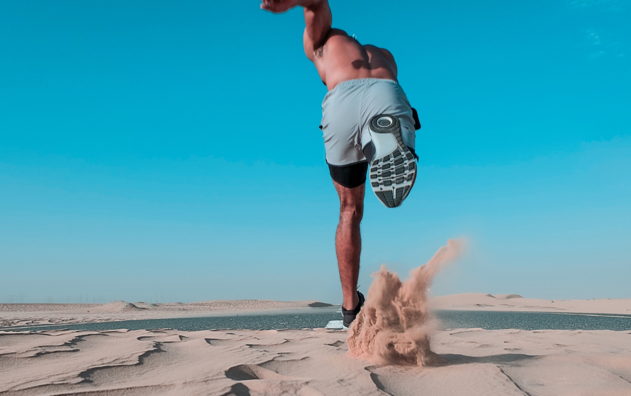 man running in sand